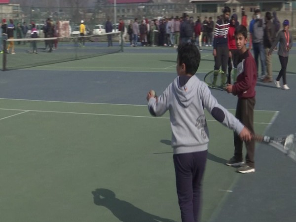 Children participate in trials being held ahead of Soft Tennis National Championship in Srinagar. [Photo/ANI]