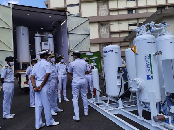 Personnel of the Indian Navy at the launch of the mobile oxygen generation plants. 