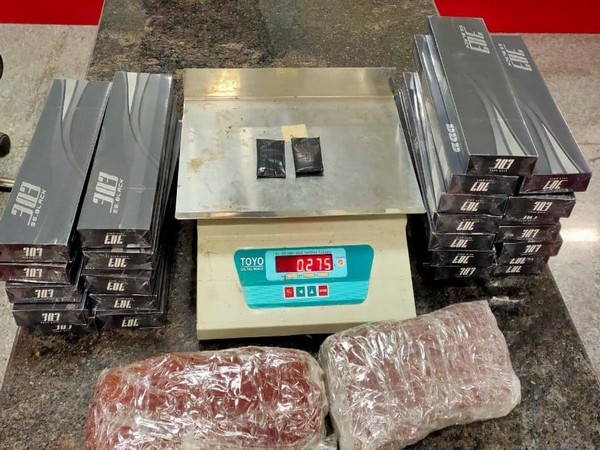 AIU of Kozhikode on Tuesday seized gold, saffron and ciggarette sticks from a passenger travelling from Dubai.