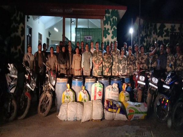 The team of 74 Battalion of BSF with the seized ganja and motorcycles. Photo/ANI