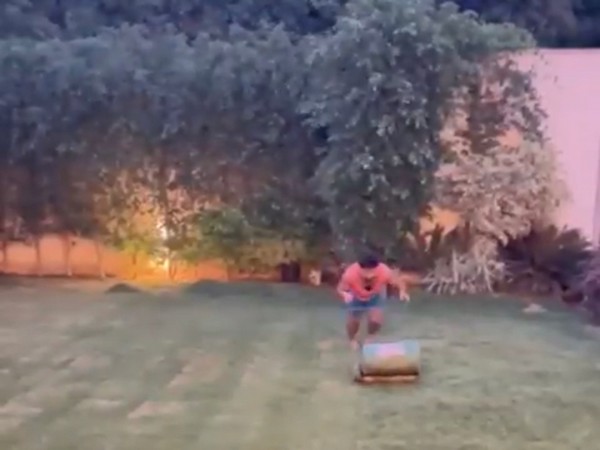 Rishabh Pant mows the lawn at home. (Photo/ Rishabh Pant twitter grab)