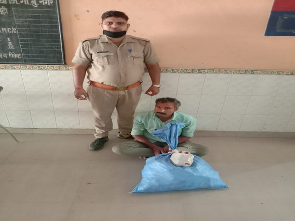 A man held for selling illegal liquor in Gautam Buddh Nagar district [Photo/ANI]