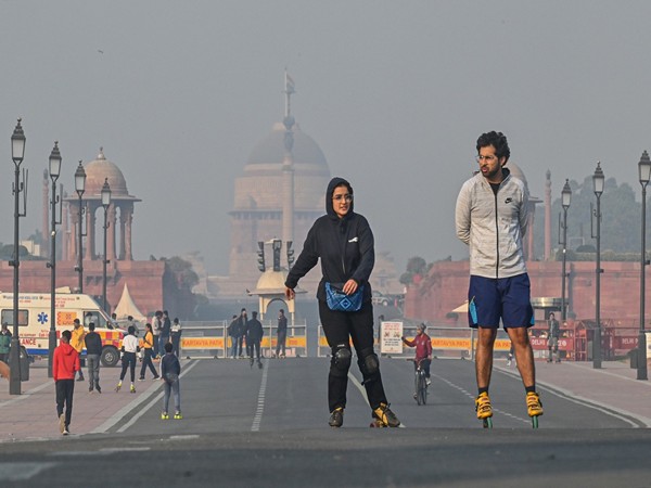 People skating on the Kartavya Path in Delhi on Sunday. (Photo/ANI)
