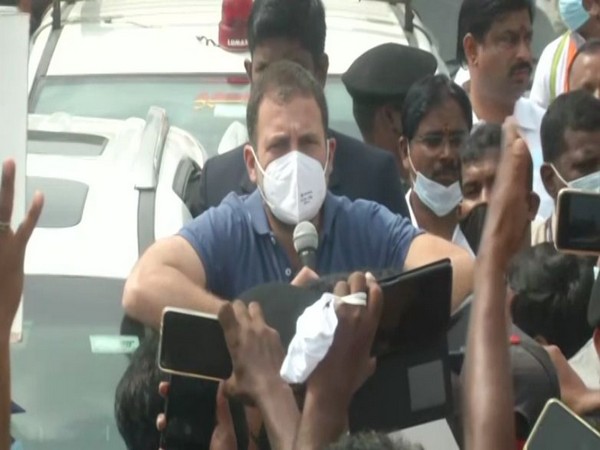 Rahul Gandhi addressing a gathering during his roadshow in Perundurai on Sunday. Photo/ANI