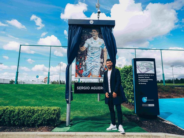 Aguero presented with mosaic inspired by his first-ever Manchester City goal.