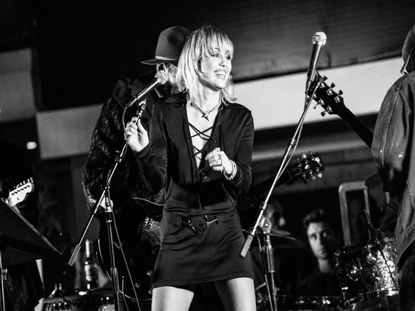 Singer Miley Cyrus  at an event celebrating the 50th anniversary of the band's Morrison Hotel. (Image courtesy: Instagram)