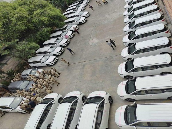 32 brand new Kia Carnival MUVs at the Pragati Bhavan. (Photo/ANI)