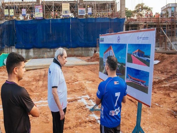 Naveen Patnaik  reviewing India's first indoor athletic stadium in the Kalinga Stadium complex. 