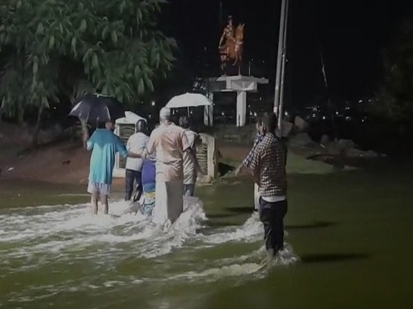 Heavy rainfall has disrupted normal life in Hyderabad. (Photo/ANI)