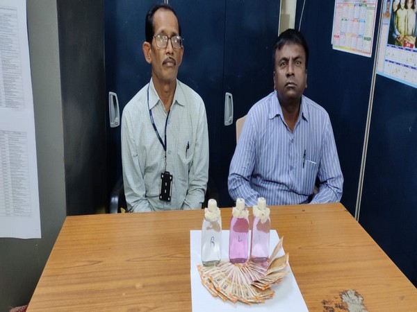 The Anti Corruption Bureau (ACB) on Tuesday caught two Hyderabad Municipal Corporation officials red-handed with bribe in Mehdipatnam area here. 