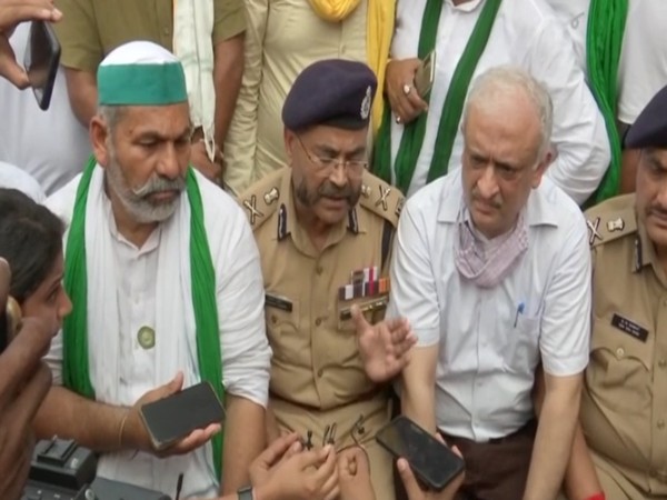 BKU leader Rakesh Tikait and ADG (Law and Order) Prashant Kumar addressing a joint PC over Lakhimpur Kheri PC. (Photo/ ANI)