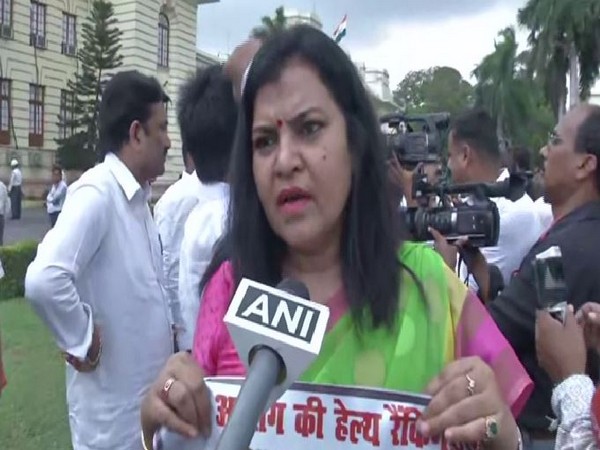 A RJD worker while speaking to ANI about the protest held against Bihar Health Minister Mangal Pandey at the Legislative Assembly on Wednesday. Photo/ANI