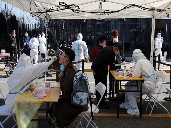 Swab samples being collected in Chaoyang district in Beijing. (Photo Credit: Reuters)
