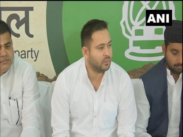 RJD leader Tejaswi Yadav holding a press meet on Wednesday.