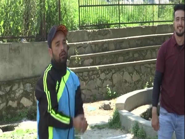 Kashmiri athlete Ahsan Ali playing with youth of the valley