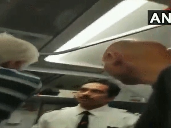 A screen grab from the video of passengers and crew of AI flight. ANI photo