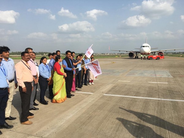 BJP MP Shankar Lalwani flagging off the Indore-Dubai flight at Indore airport on Monday. (Photo/ANI)