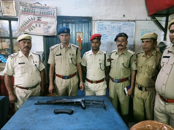 Visual of police personnel with the AK-47 rifle