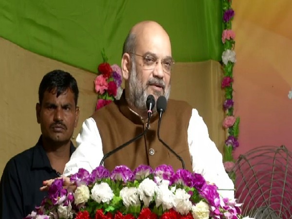 Union Home Minister Amit Shah speaking at a Durga Puja Pandal in Kolkata, West Bengal on Tuesday. 
