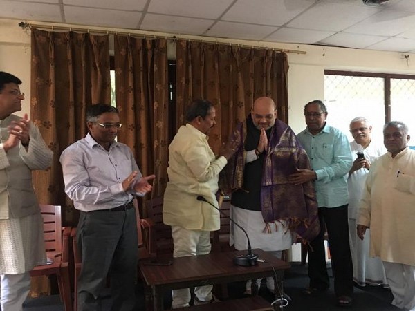 BJP national president and Union Home Minister Amit Shah being felicitated at BMS headquarters in New Delhi. Photo/ANI 
