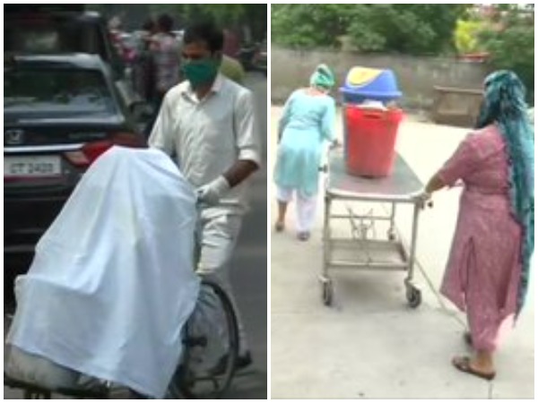 Sanitation workers at Guru Nanak Dev Hospital in Amritsar used stretchers, wheelchairs to dispose waste. Photo/ANI