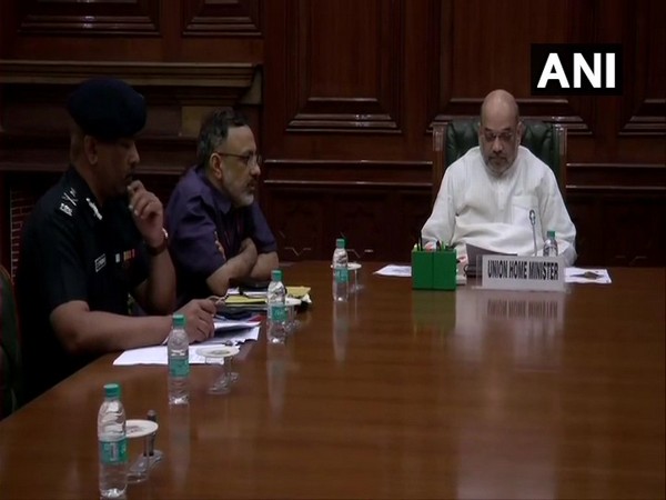 Union Home Minister Amit Shah while conducting high-level meeting to review current flood situation on Saturday in New Delhi. Photo/ANI