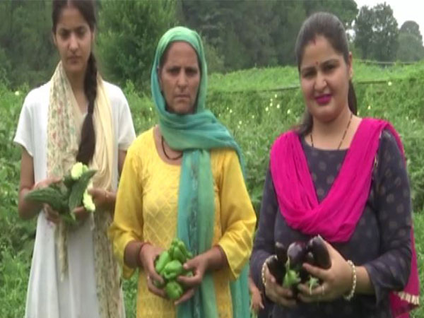 Residents of Baljarrallan with their produce (file photo/ANI)