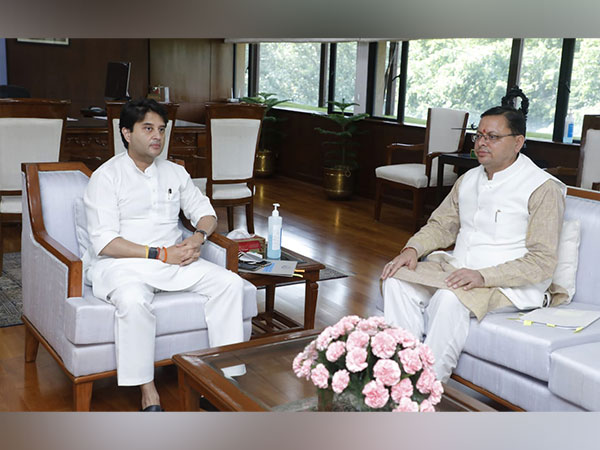 Uttarakhand CM Pushkar Singh Dhami with Union Aviation Minister Jyotiraditya Scindia (Photo/ANI)