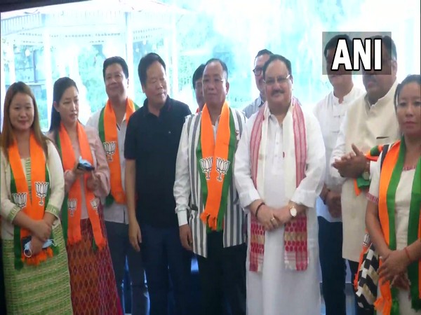 Techi Kaso with BJP national president JP Nadda (Photo/ANI)