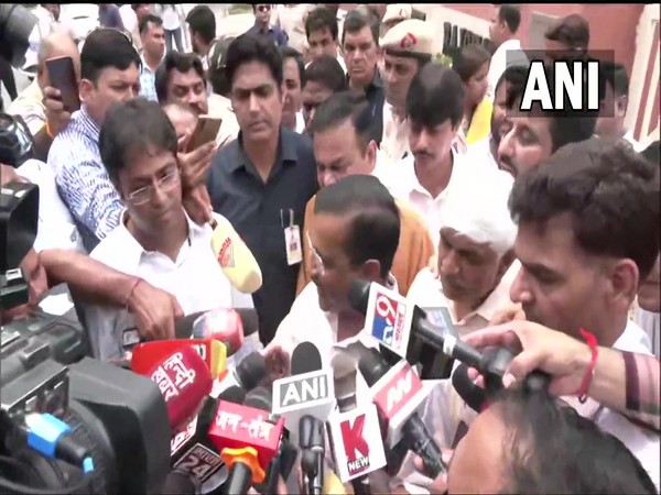 Delhi CM Arvind Kejriwal talking to media (Photo Credit: ANI)