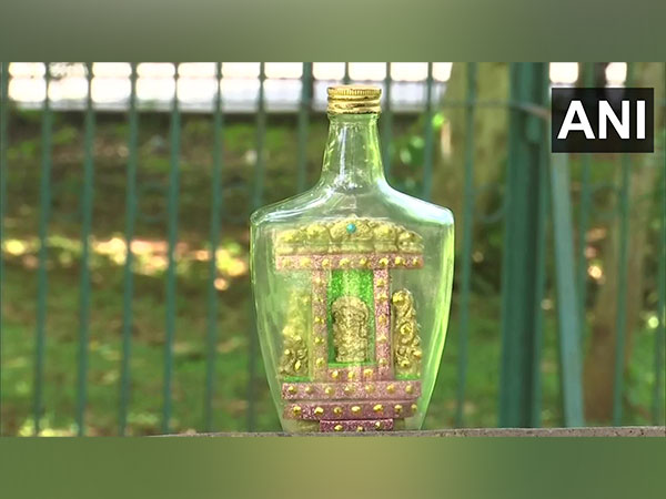 Bhubaneshwar-based miniature artist L Eswar Rao crafted eco-friendly idol of Lord Ganesh inside a bottle (Photo/ANI)