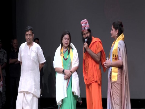 Yoga Guru Baba Ramdev along with Union Minister Meenakshi Lekhi and Navneet Rana at the event