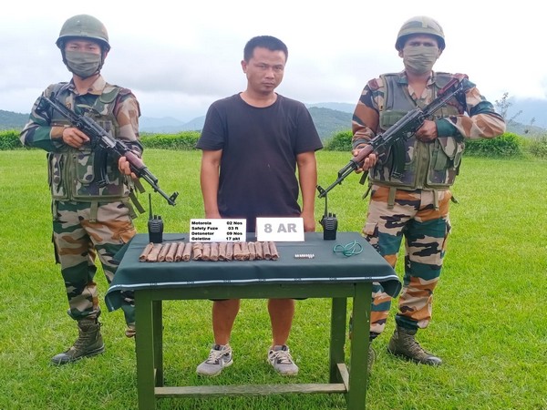 Assam Rifles troops with detained person