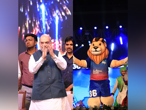  Amit Shah and mascot of 36th National Games (Photo: PIB)
