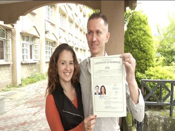 The newly-wed couple, Alona Burmaka and Sergey Novikov. (ANI)