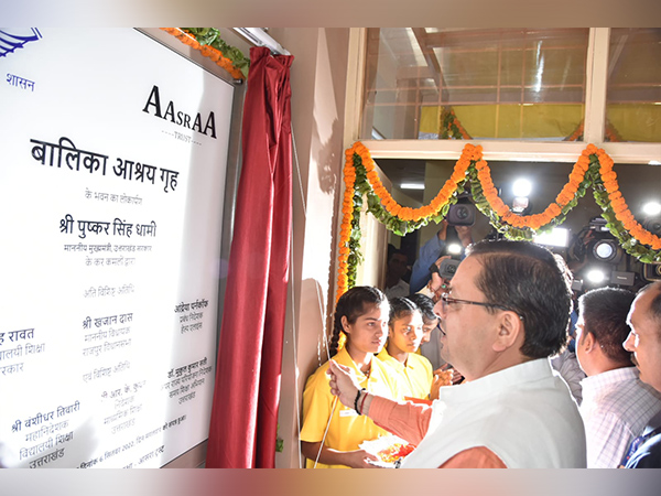 Uttarakhand CM Pushar Singh Dhami inaugurates shelter home for 200 underprivileged girl child in Dehradun. (ANI/photo)