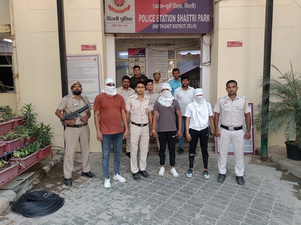 The accused with Delhi Police. (ANI/Photo)