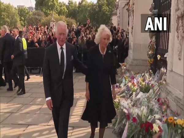 King Charles III and Queen Consort Camilla arrive at Buckingham Palace in London. 
