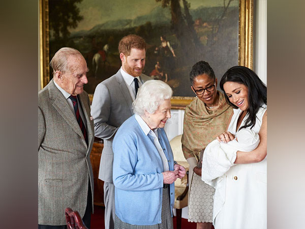 Queen Elizabeth II with Prince Harry, Meghan Markle (Image Source: Twitter)