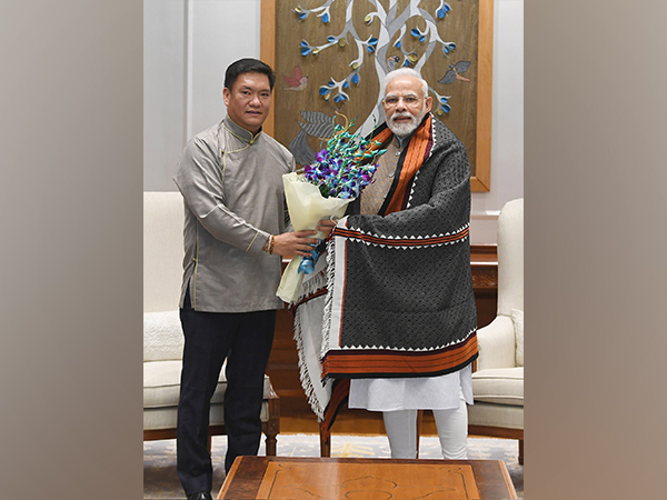 Arunachal CM Pema Khandu with Prime Minister Narendra Modi (source: PMO twitter)