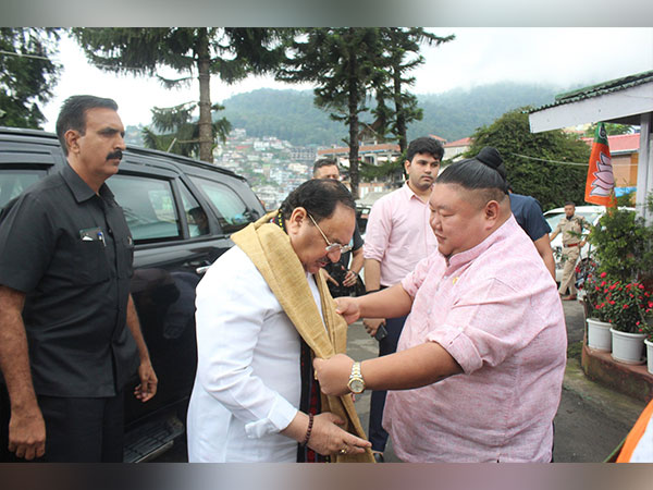 Nagaland minister Temjen Imna Along welcoming BJP national President JP Nadda (Photo/ANI)