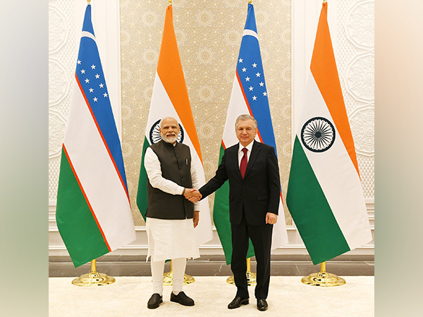 Prime Minister Narendra Modi with Uzbek President Shavkat Mirziyoyev 