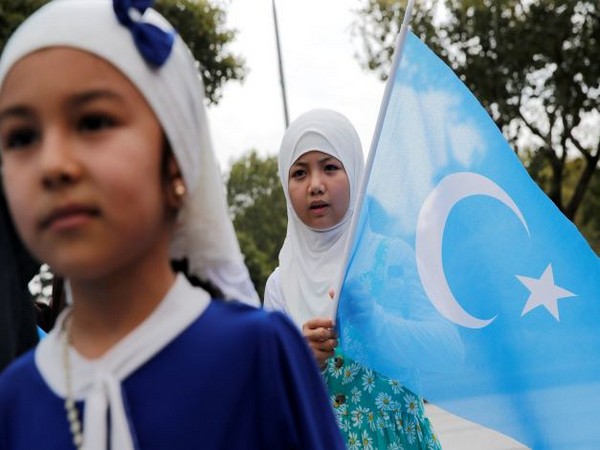 Ethnic Uyghur demonstrators take part in a protest against China. (Photo Credit - Reuters)
