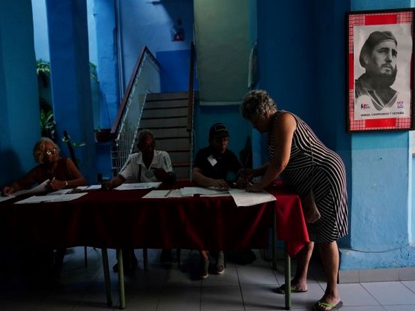 People vote during the new family code referendum in Havana. (Photo Credit - Reuters)