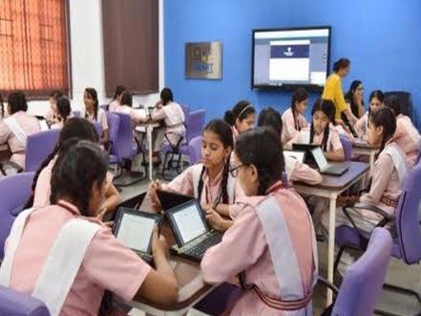 Youngsters enjoy the pleasures of reading (Photo/ANI)