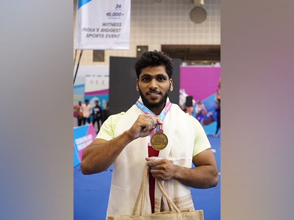 Tamil Nadu's weightlifter N Ajith after winning gold in 36th National Games (Image: SAI/MYAS media)