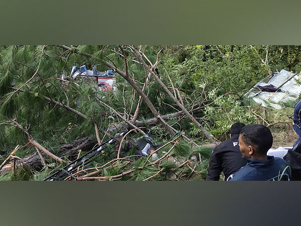 Team of rescuers searching for survivers of  Pauri Garhwal bus accident