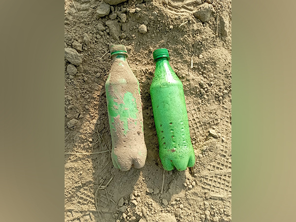 Two bottles of heroin seized by the BSF at Amritsar border (Photo/ANI)