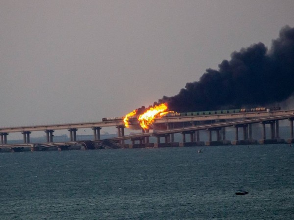 Kerch bridge that connects Crimean Peninsula with mainland Russia on fire. (Photo Credit - Twitter/Clint Ehrlich)