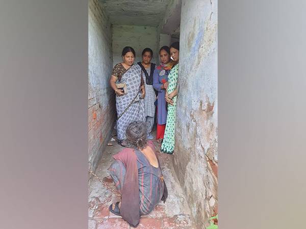 Rescued woman with NGO workers in UP's Firozabad (Photo/ANI)